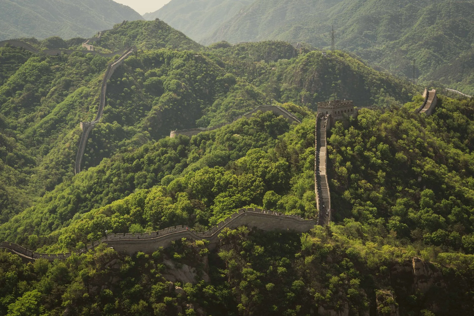 The Ming Great Wall following forested ridges north of Beijing
