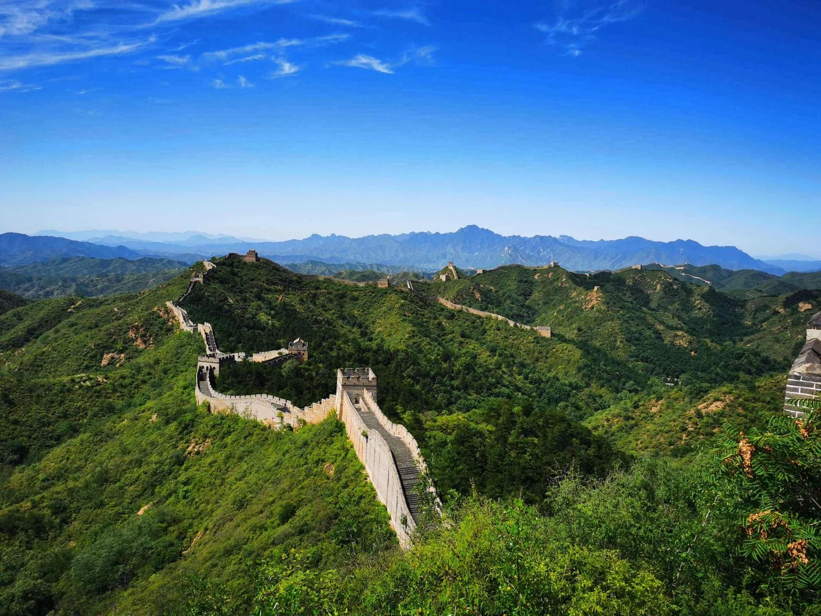 Great Wall of China winding over mountain ridges