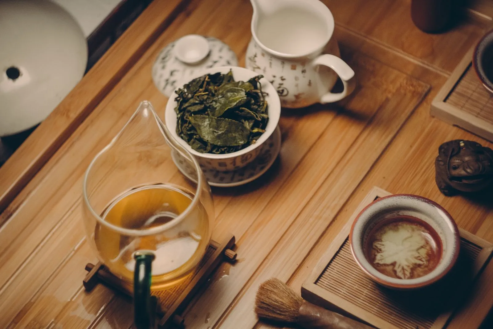 Loose-leaf Chinese tea brewed in a glass pot