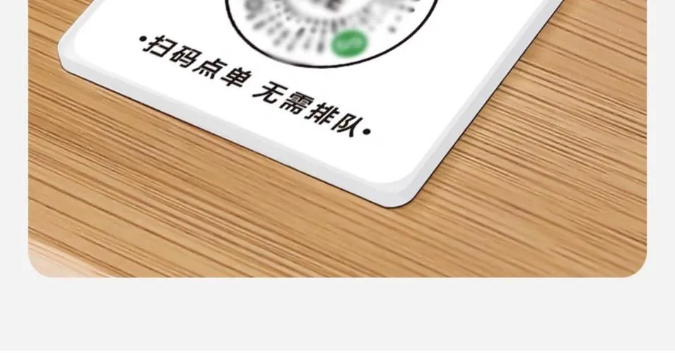 A scan-to-order QR code on a restaurant table