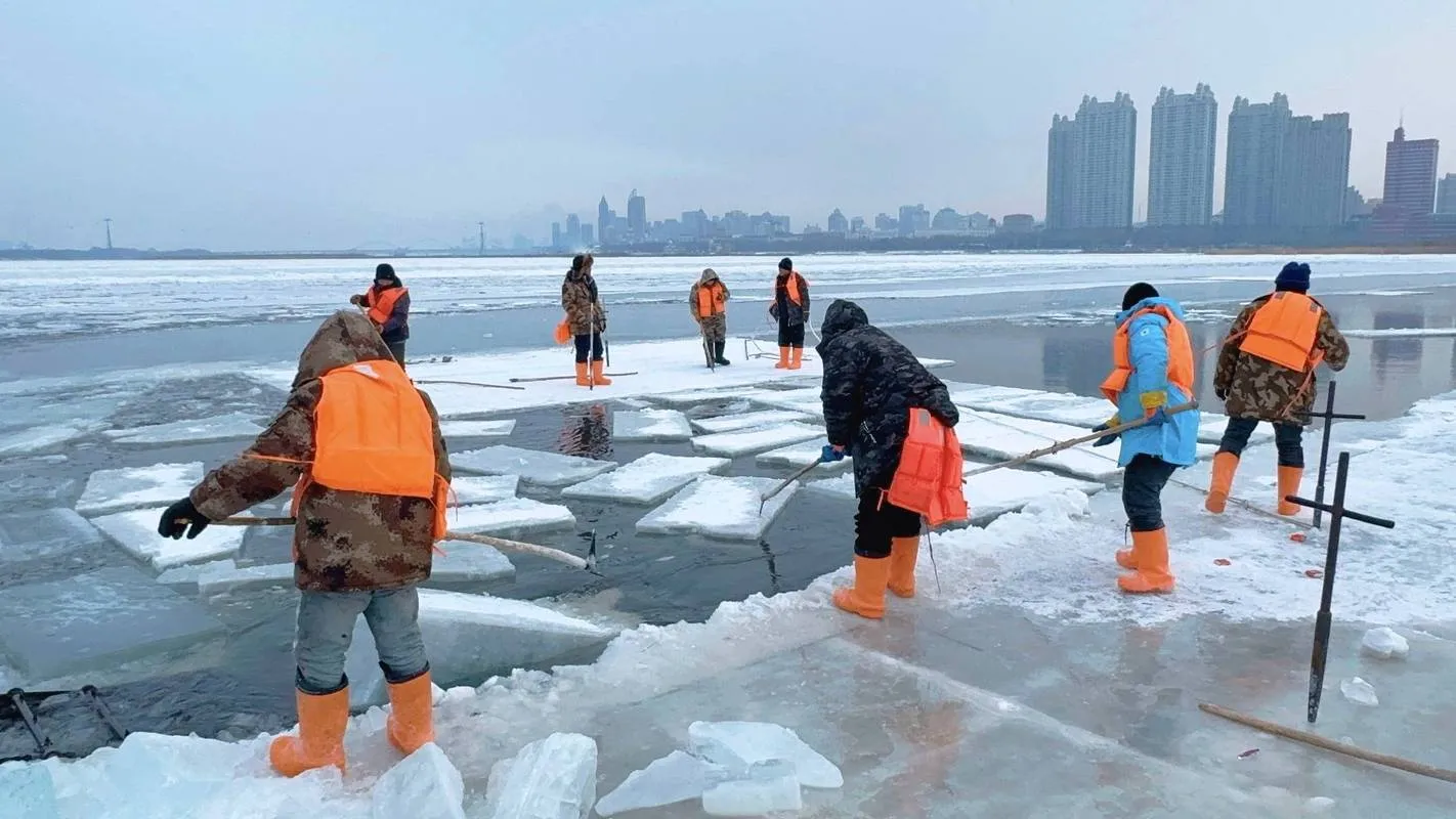 Ice harvesting on the frozen Songhua River