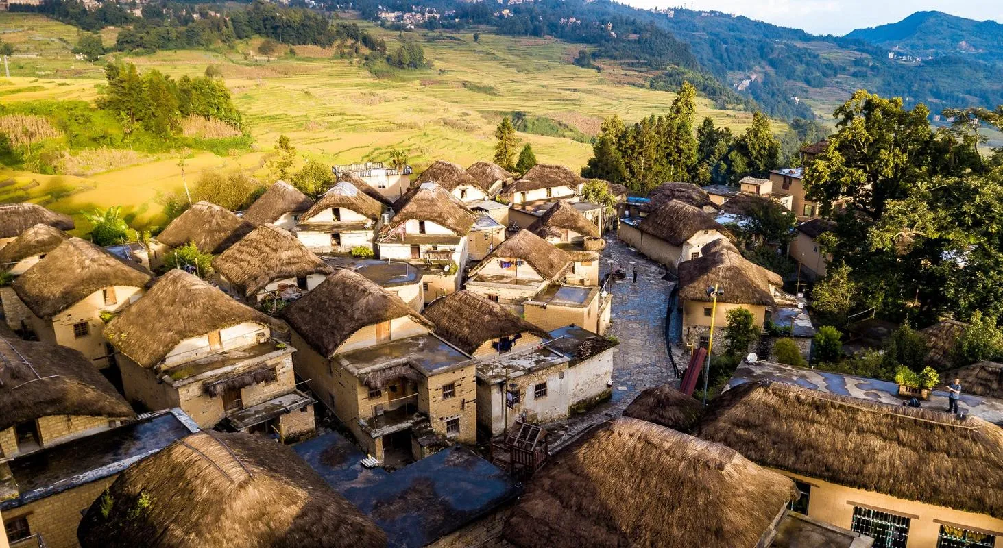 Traditional Hani mushroom houses with thatched roofs in Azheke village, a UN Tourism Best Tourism Village
