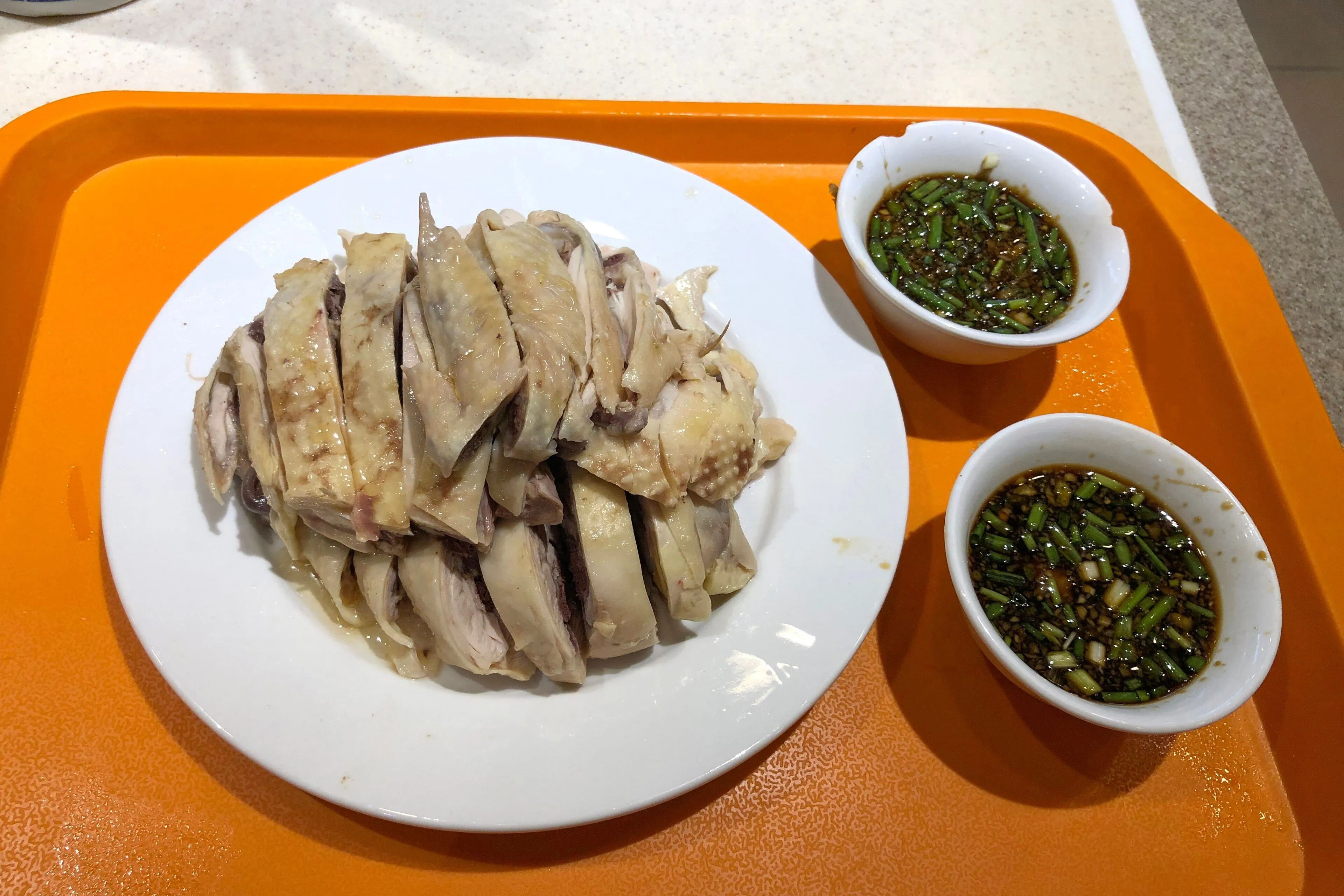 White-cut chicken (baiqie ji) poached in a plain master stock, Guangzhou