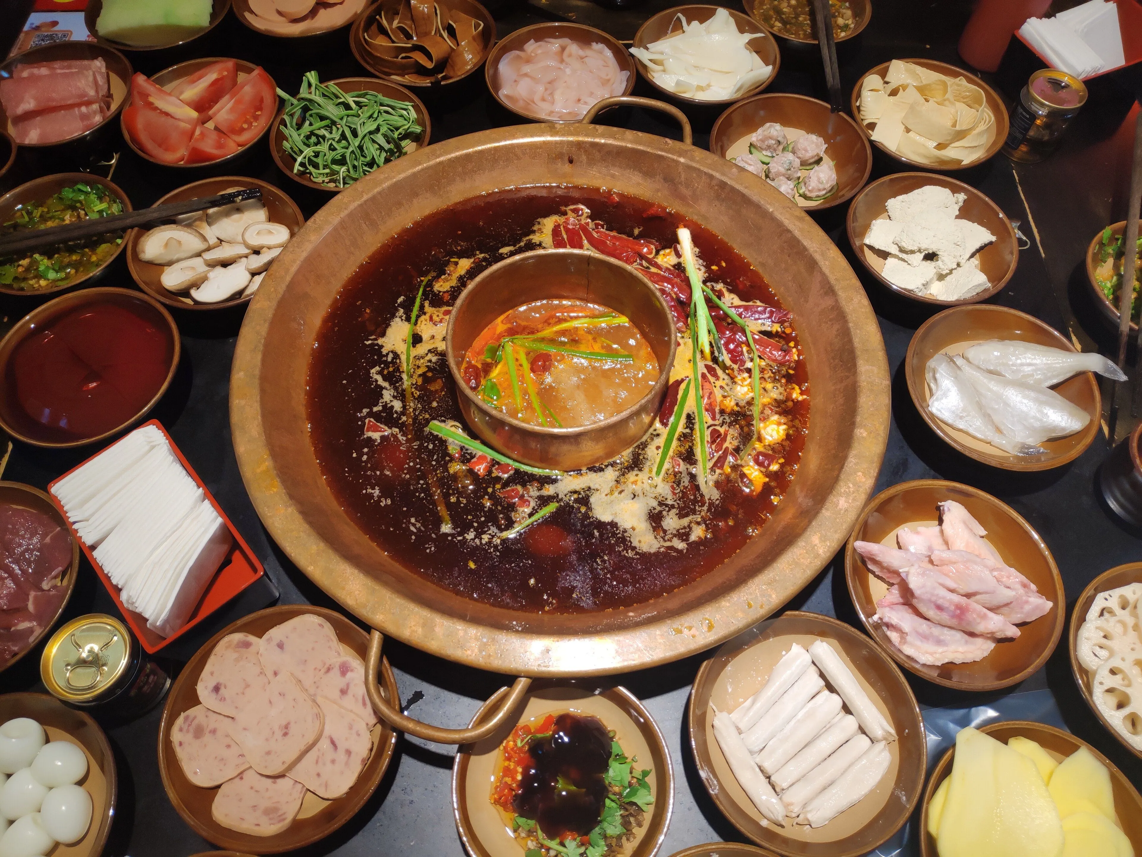 Chongqing hotpot — red broth of beef tallow, chilli and Sichuan pepper