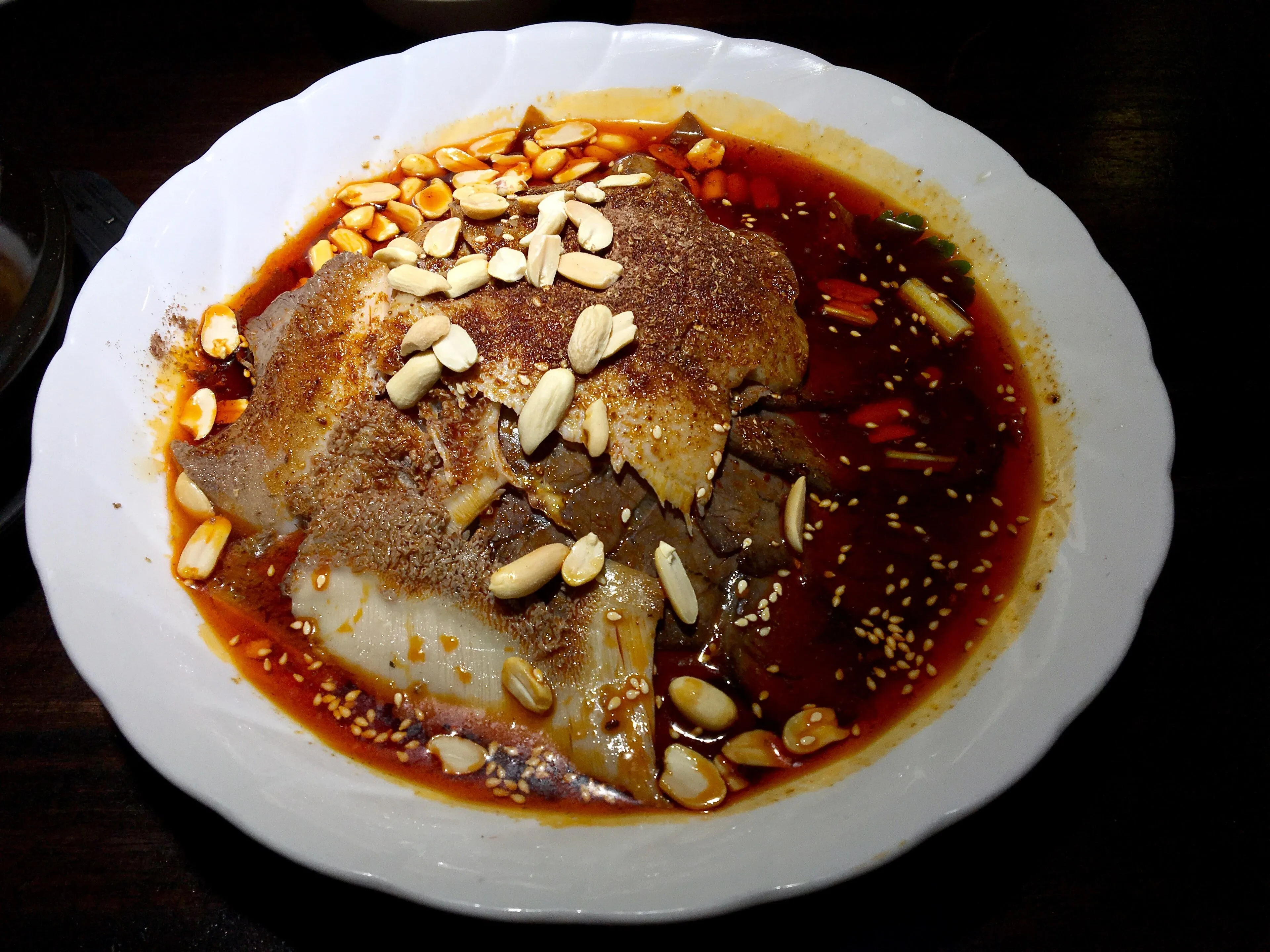 Fuqi feipian — beef offal slices dressed in red oil, a Chengdu cold starter