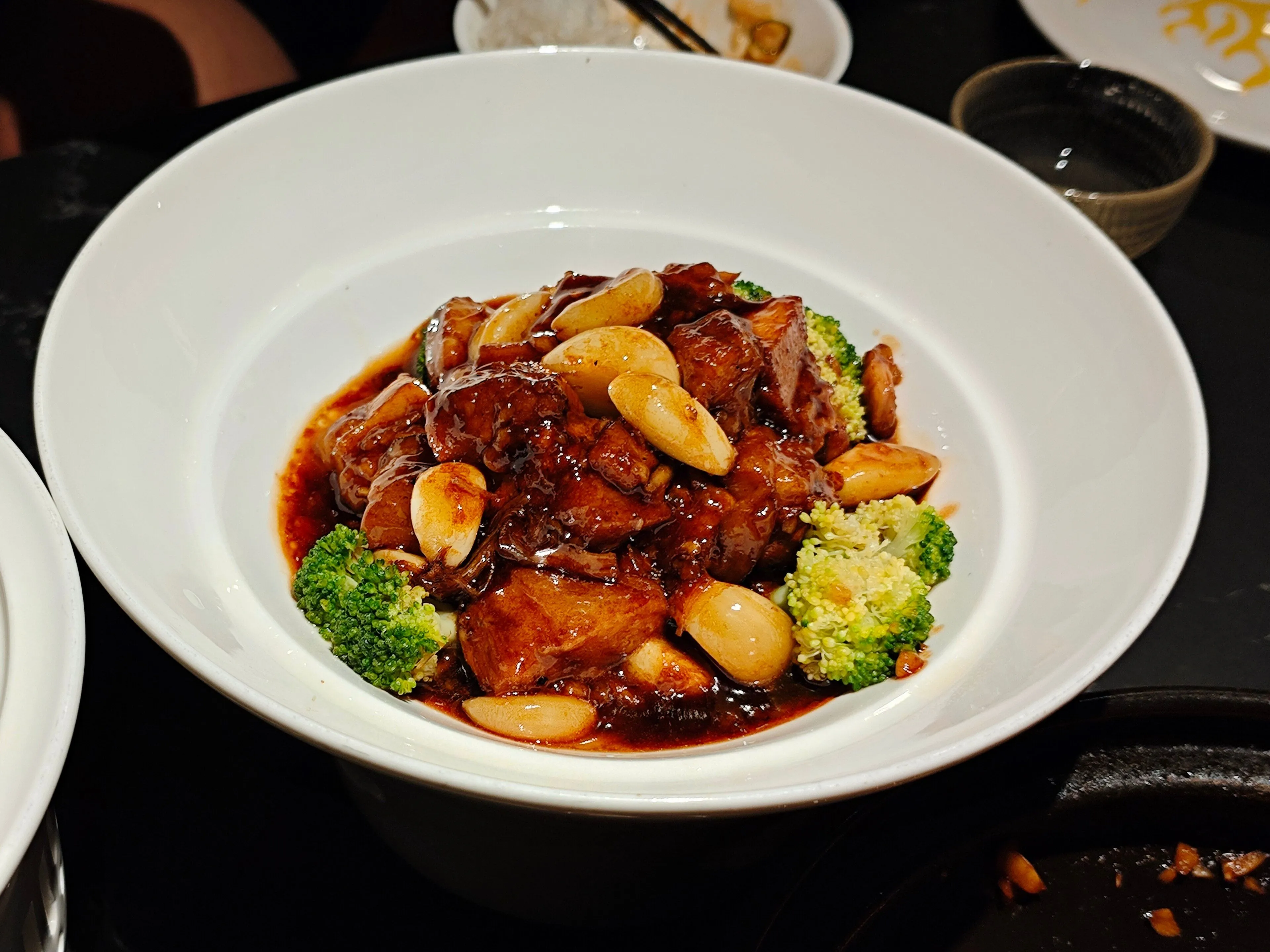 Hongshao rou — red-braised pork belly in a dark glossy sauce, Shanghai