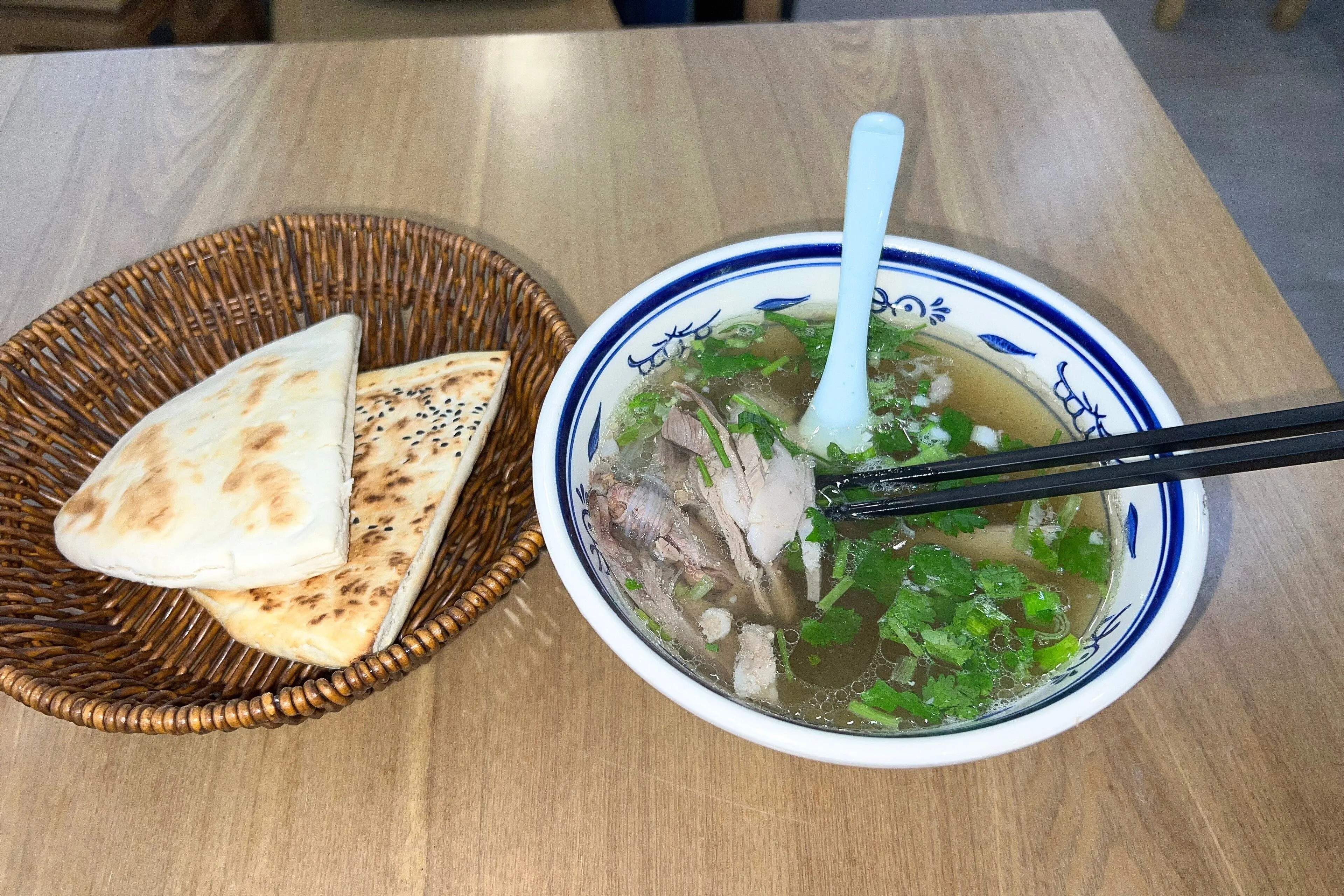 Shuipen yangrou — mutton in a wide bowl of broth with bread to soak, Xi'an
