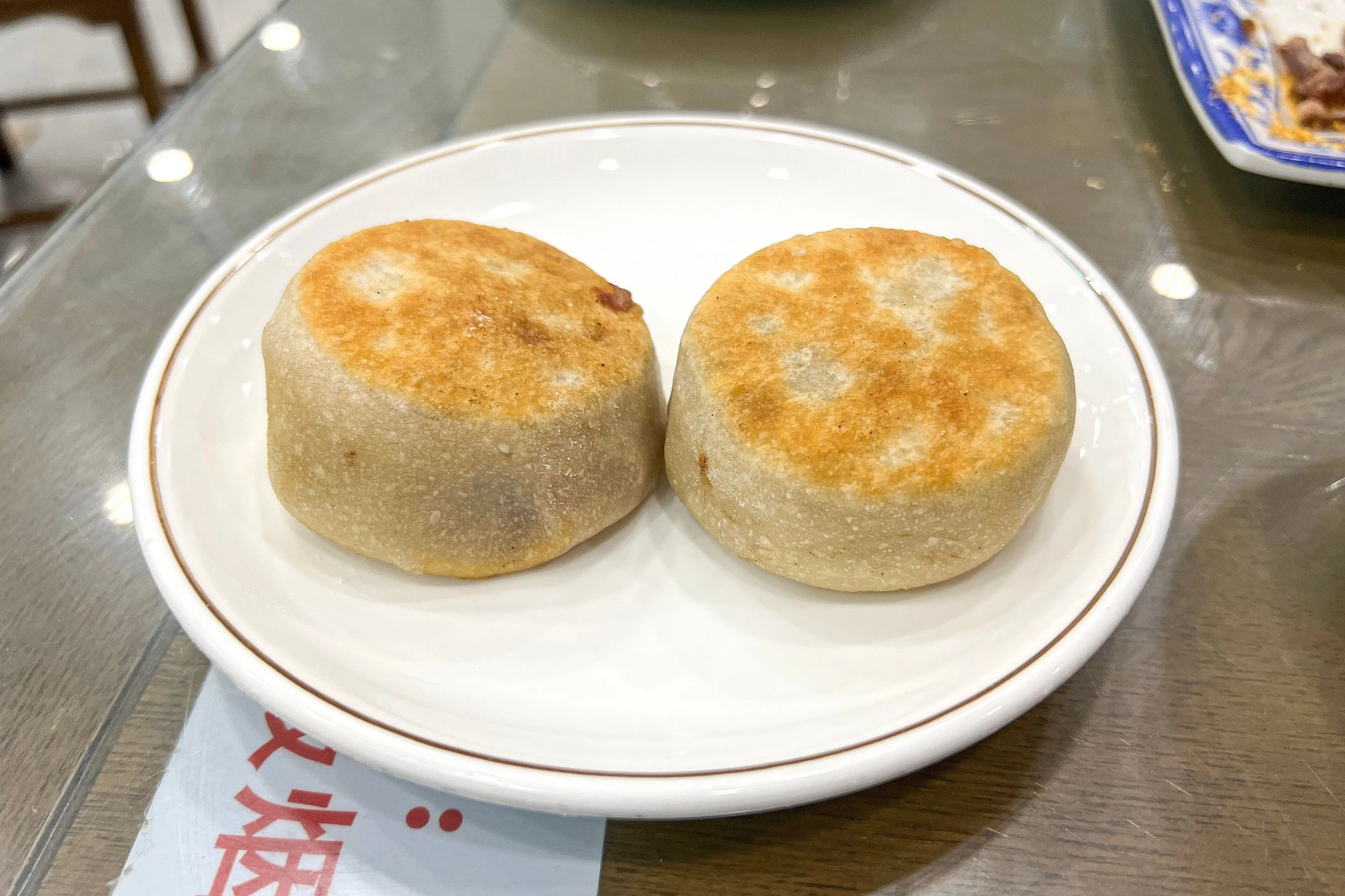 Mending rou bing — a thin-skinned beef pie full of hot juice, Beijing