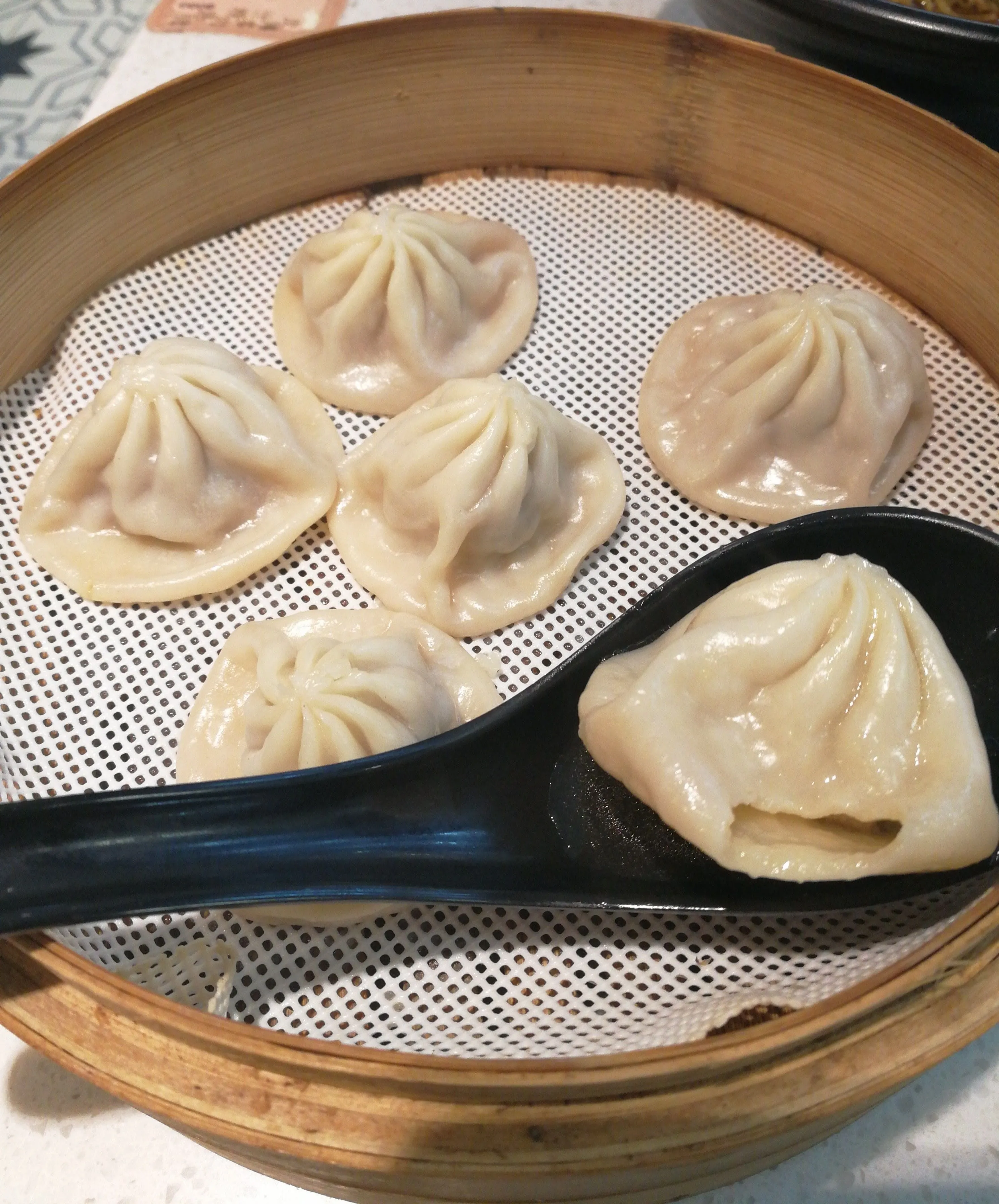 Xiaolongbao soup dumplings fresh from the steamer, Nanjing