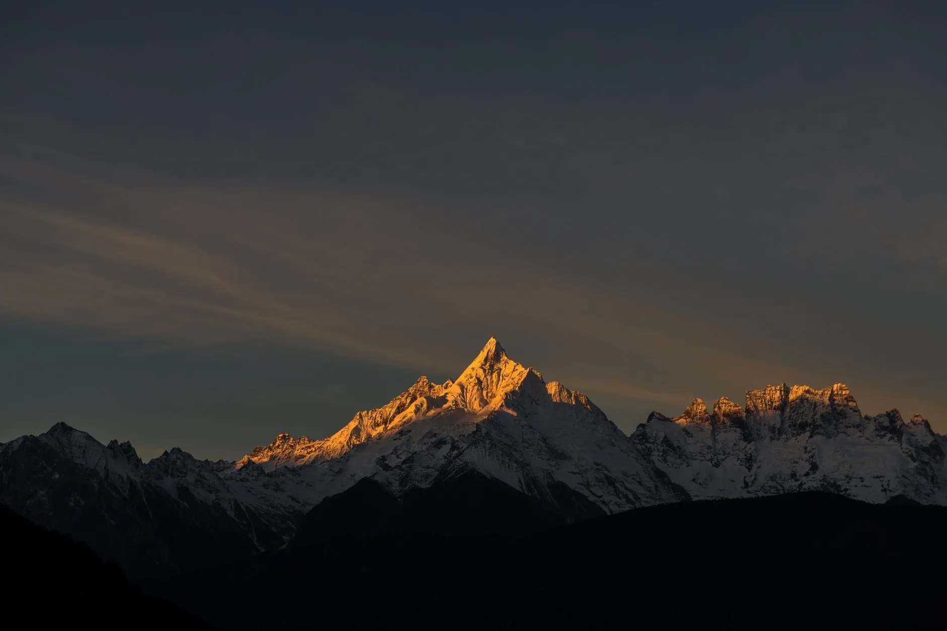 Kawa Karpo (Kawagebo) golden sunrise over the Meili range