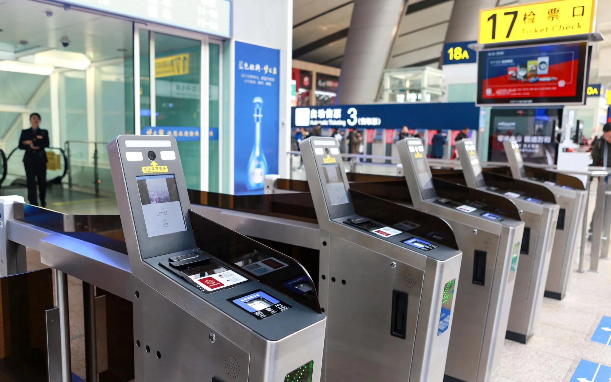 Ticket gate turnstiles at a Chinese high-speed rail station