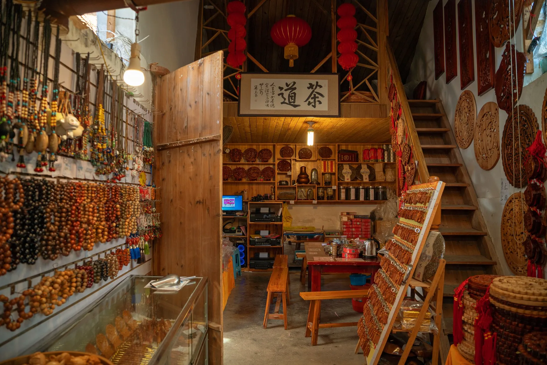 A crafts and souvenir shop inside a Chinese heritage lane, where handmade goods fill the shelves