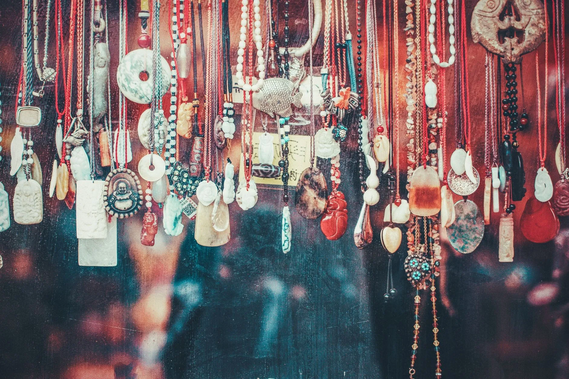 Jade pendants and carvings for sale at a Chinese flea-market stall