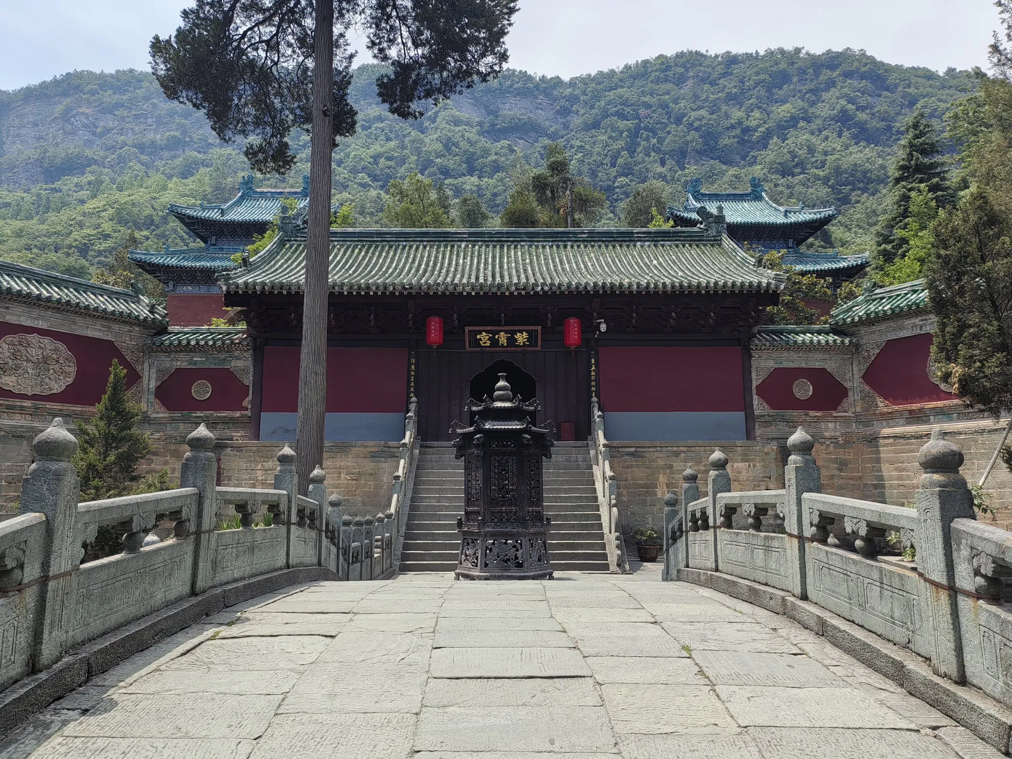 The entrance gate of Zixiao (Purple Cloud) Palace on Wudang Mountain, Hubei, with a bronze censer on the terrace below