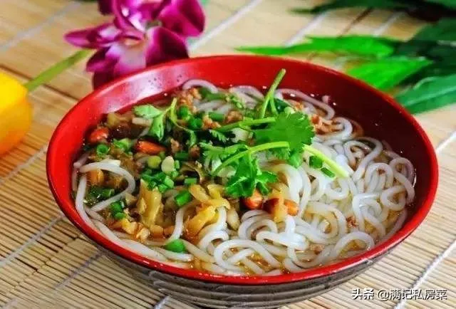 Guilin Rice Noodles — round, smooth rice noodles in a pool of master stock, topped with fried soybeans and pickled beans