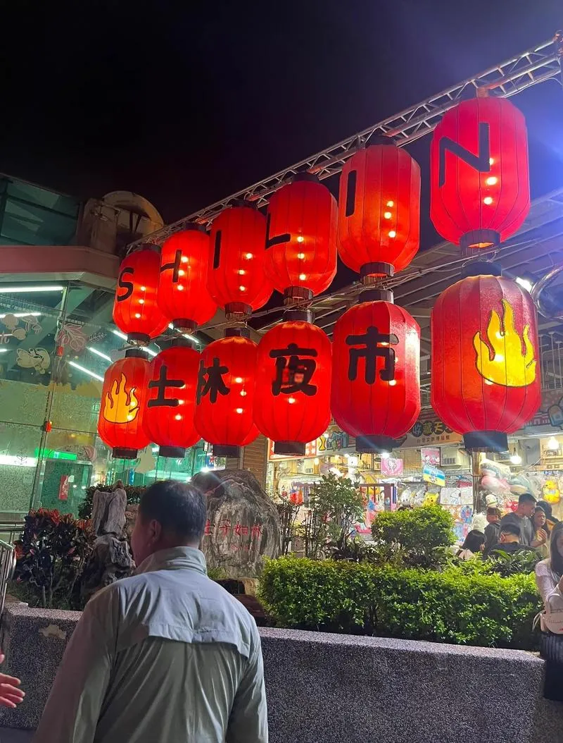 Shilin Night Market in Taipei -- blazing lights and crowds at the entrance